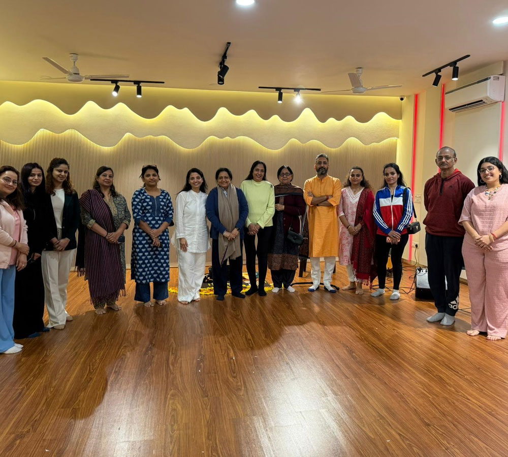 Corporate music therapy workshop with employees participating in a musical experience